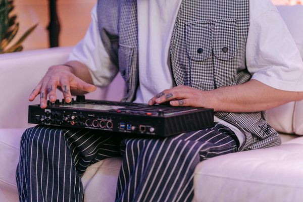 A person moving gracefully through an exercise sequence in a bright studio.